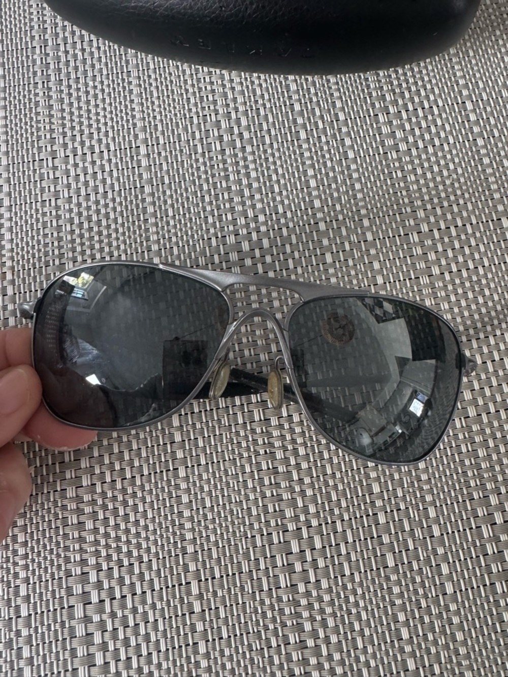 Oakley Silver Aviator Sunglasses with Dark Gray Lenses